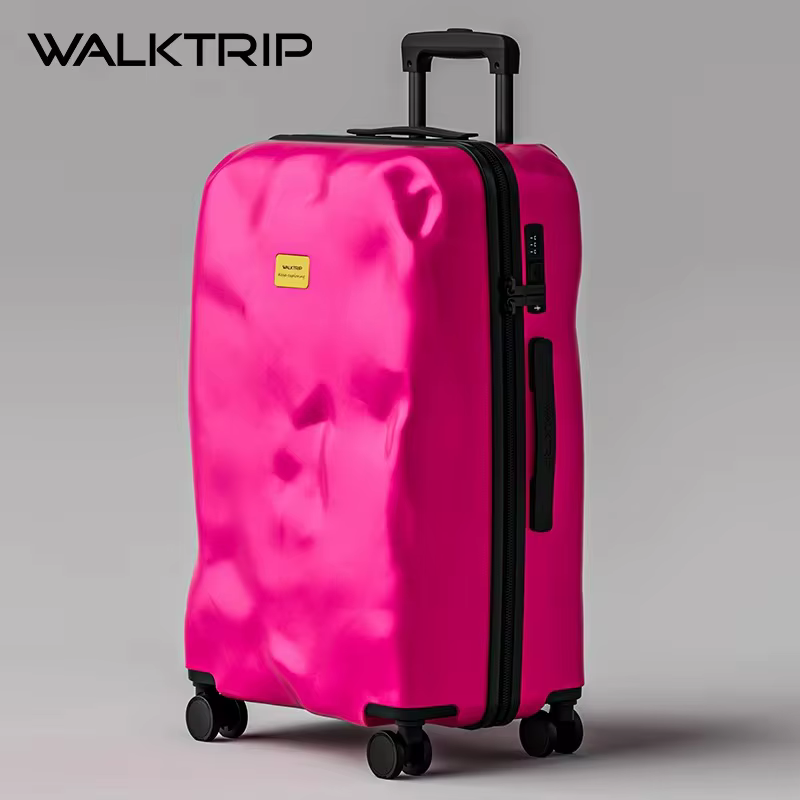 Valise créative au design irrégulier cratère de météorite, tendance rétro, bagage à roulettes de voy