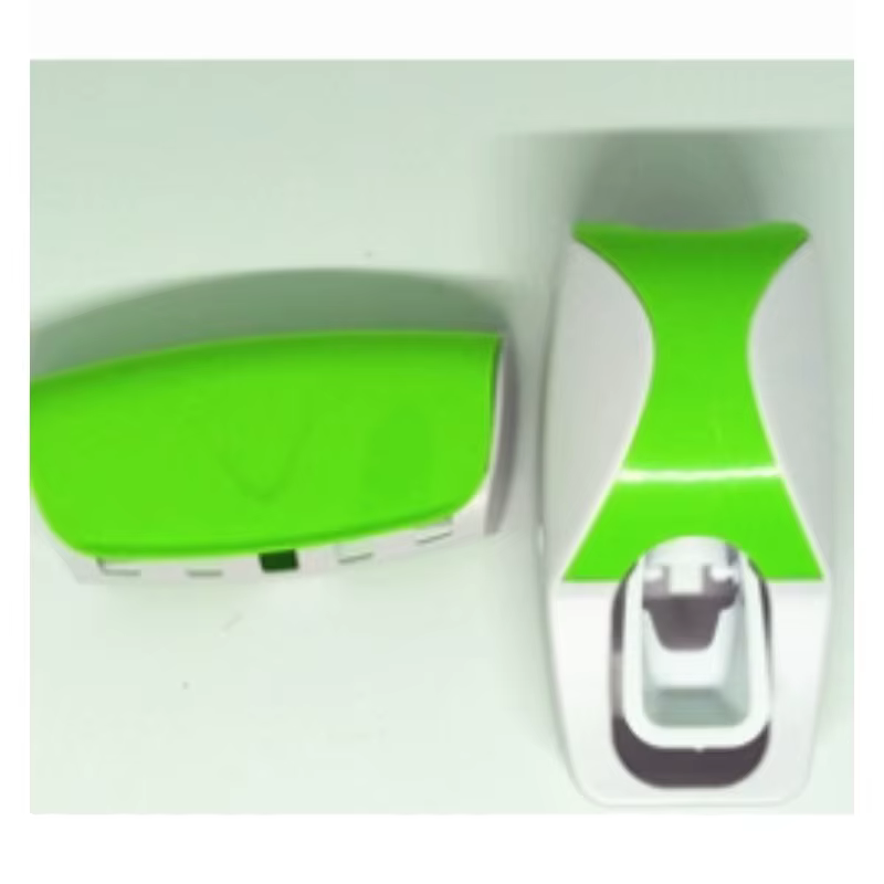 Un ensemble de porte-brosse à dents mural avec un dentifrice automatique - dispositif de compression