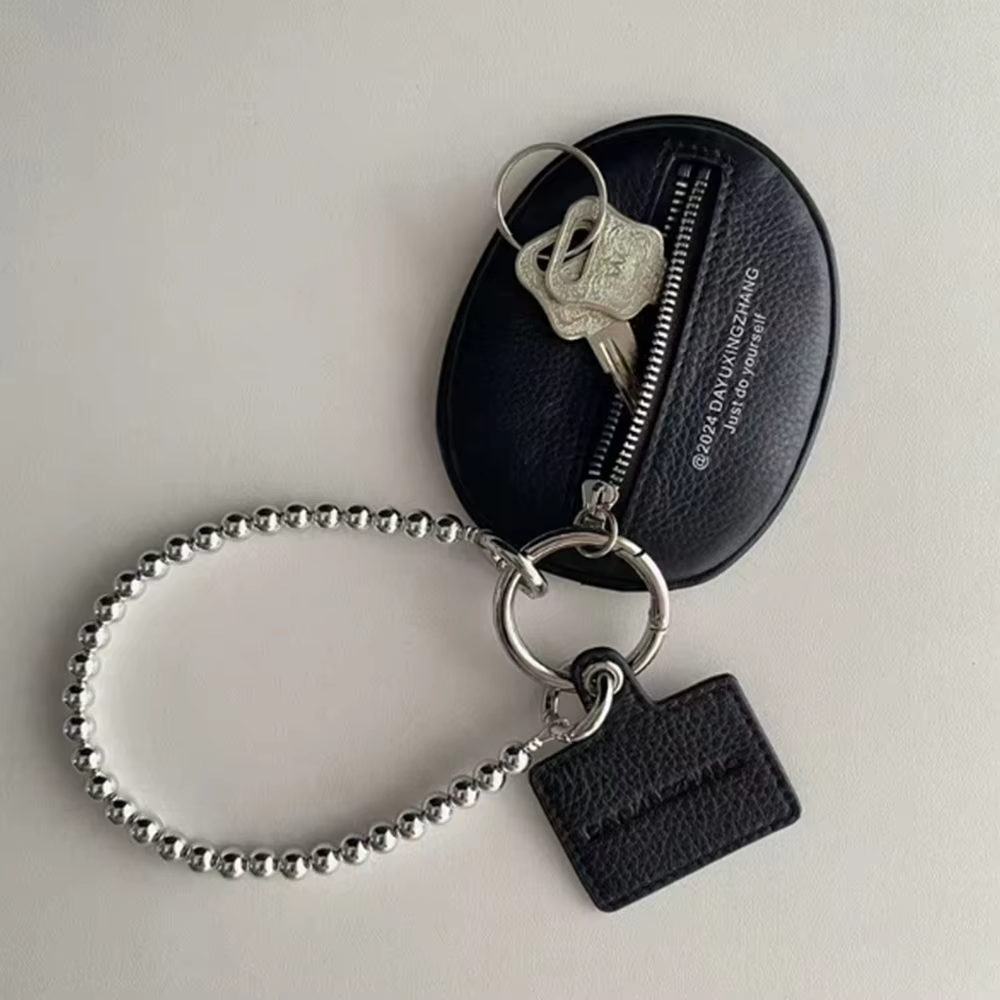 Sac à clés élégant, un sac suspendu pour accessoires élégants, regardez