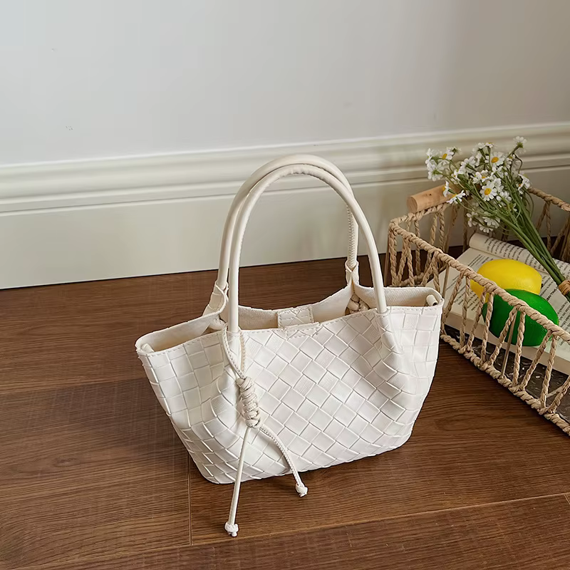Nouveau sac seau tissé haut de gamme version coréenne, sac à bandoulière décontracté pour le quotidi
