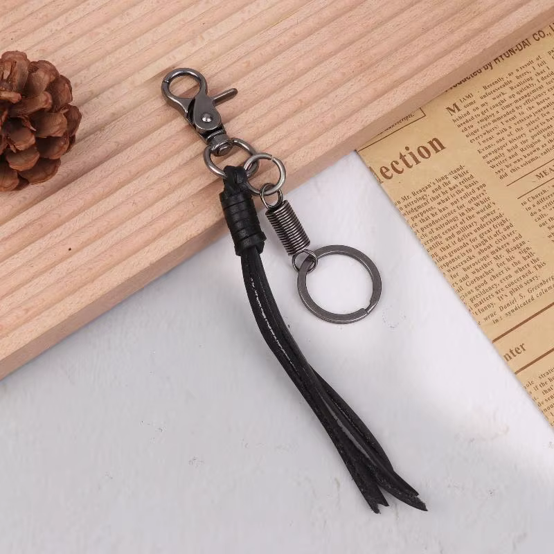 Accessoire chic en cuir PU avec breloque pour sac porte-clés à pampilles en peau de vache ; Idéal po