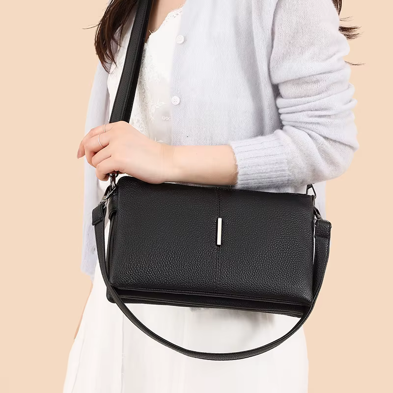 Sac à bandoulière minimaliste en cuir véritable pour femmes